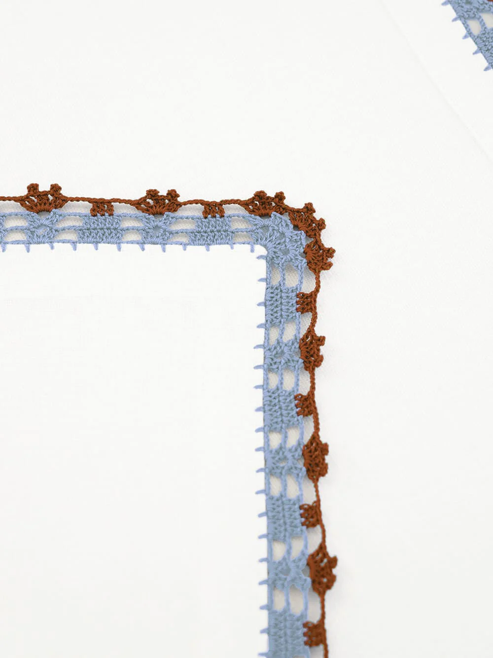 Hand-Embroidered Leonor Ecru Linen with Blue and Brown Crochet Napkin - Image 3
